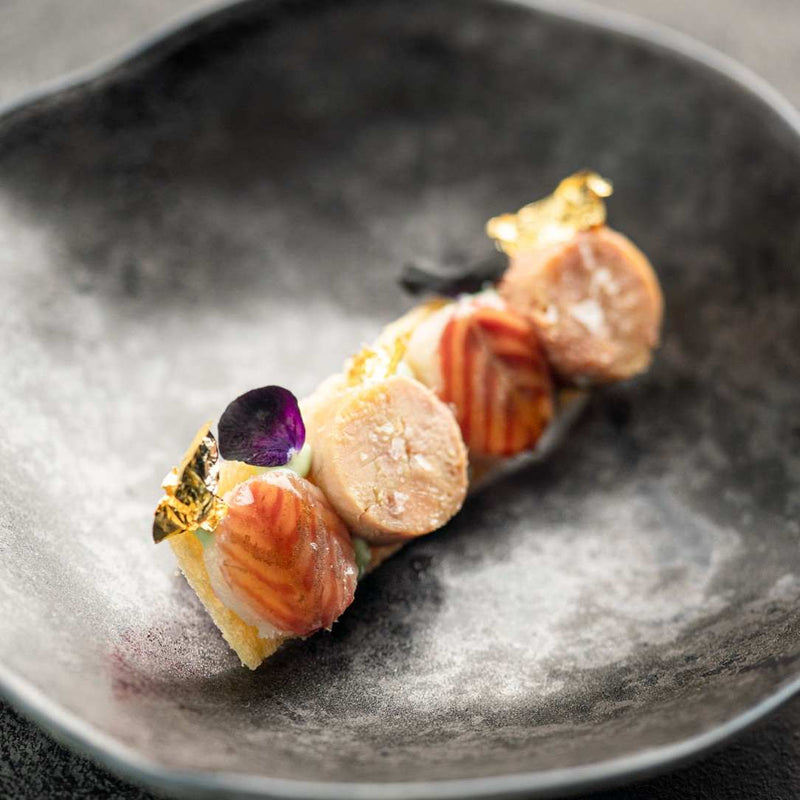 Delicate dish of dessert on a Luxury Limoges porcelain small plates Graphite No5 Indulge Sarah-Linda