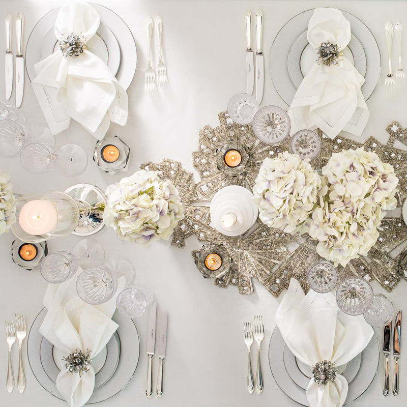 Styled table with Handcrafted artificial hydrangea stem in lavender and white made from waxed silk by Silk-ka, from the Flowers For Life collection by Amiramour.
