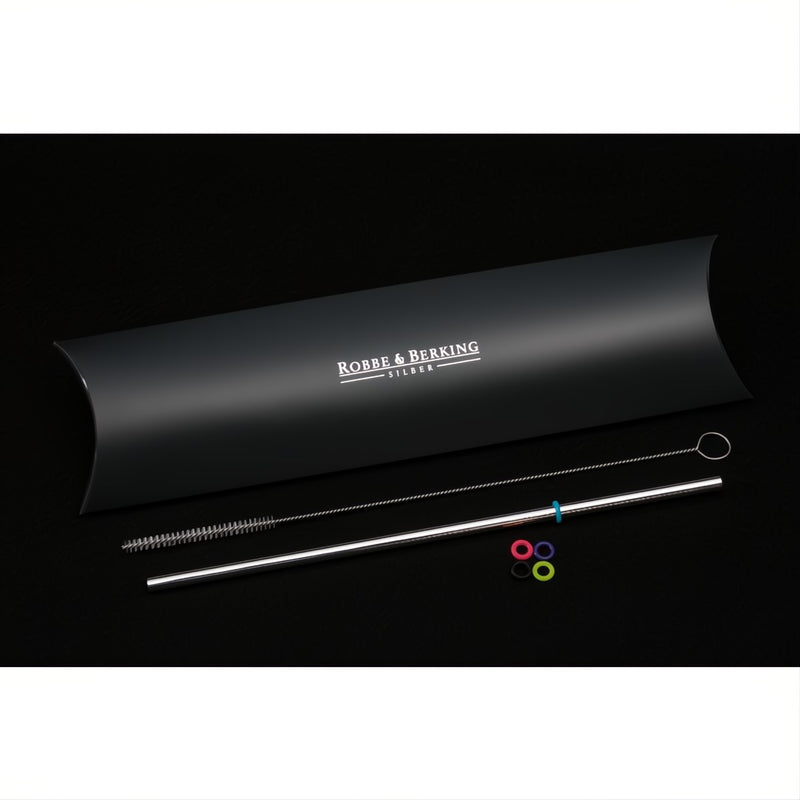 Case containing Silver-plated reusable drinking straw with cleaning brush and decorative rings by Robbe & Berking.