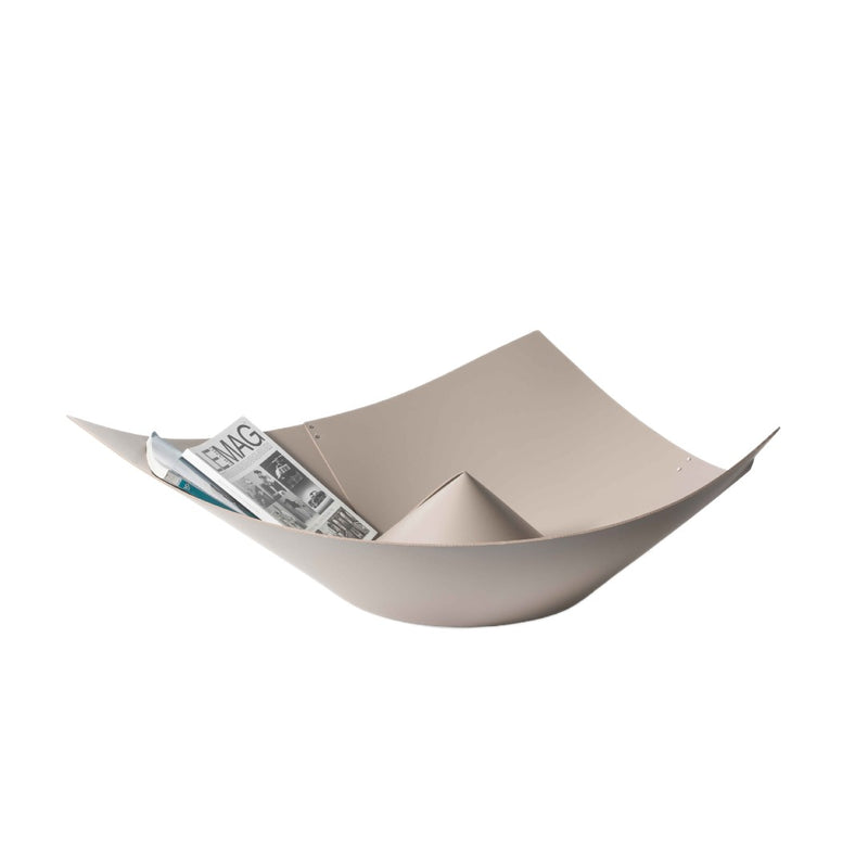 sombrero medium storage basket regenerated leather in cream by pinetti  with a magazine inside on a white background