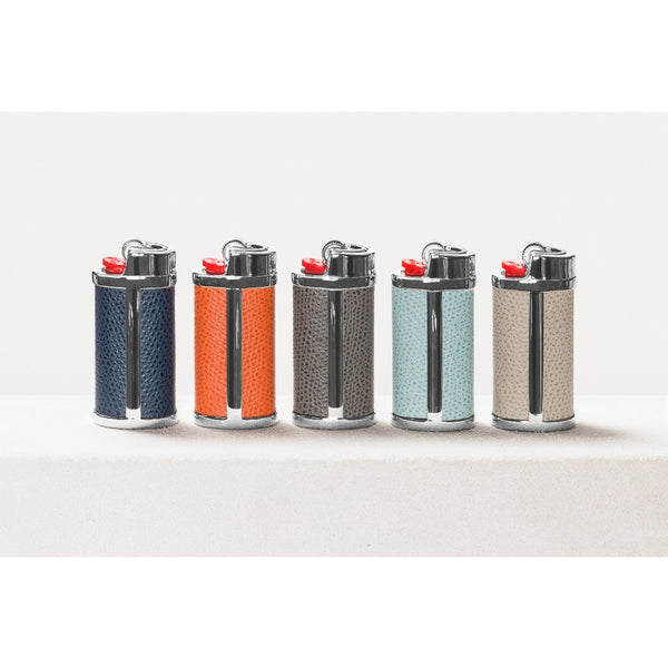 Five colorful lighters arranged in a row on a white background