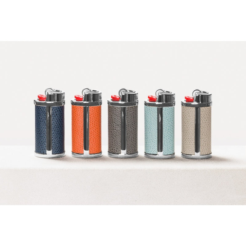Five colorful lighters arranged in a row on a white background