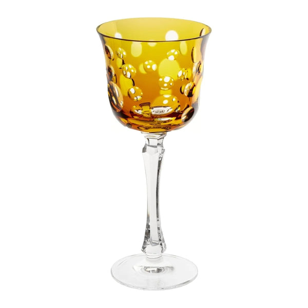 Amber Staccato water glass with bubble cut design by Cristallerie de Montbronn.