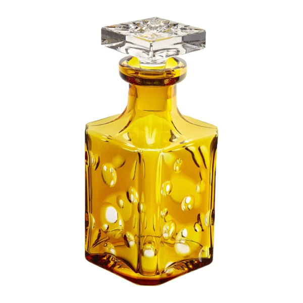 Amber crystal whiskey decanter with bubble cut design from the Staccato collection by Cristallerie de Montbronn.