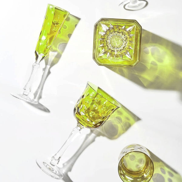 Styled Pastel green Staccato white wine glass with bubble cut crystal design by Cristallerie de Montbronn.