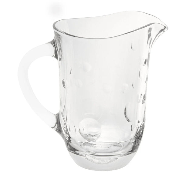 Side view of the Crystal water pitcher with bubble cut design from the Staccato collection by Cristallerie de Montbronn.
