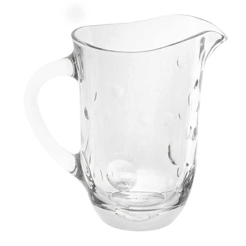 Side view of the Crystal water pitcher with bubble cut design from the Staccato collection by Cristallerie de Montbronn.