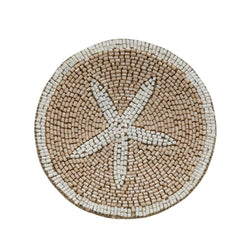 Round drink coaster with starfish design on a white background