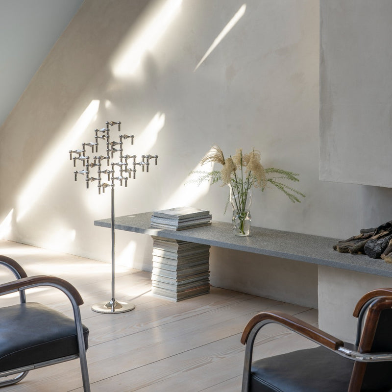 styled room corner with the sculptural stoff nagel floor stand
