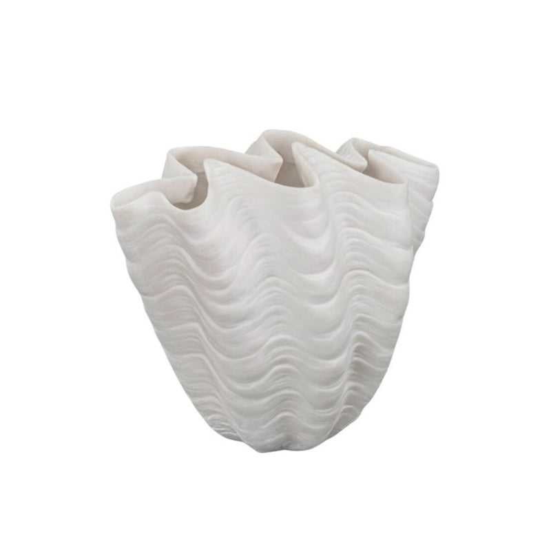 White ceramic vase with wavy texture on a white background