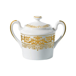 A white and gold porcelain sugar bowl with floral motifs and a lid, featuring intricate Gothic tapestry-like patterns.