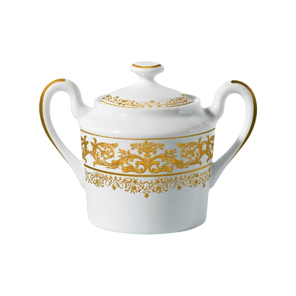 A white and gold porcelain sugar bowl with floral motifs and a lid, featuring intricate Gothic tapestry-like patterns.