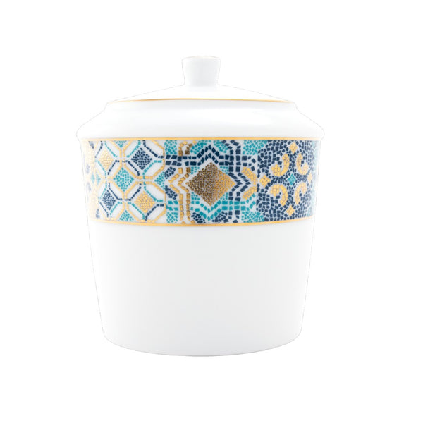 White sugar bowl with a decorative blue and gold band on a white background