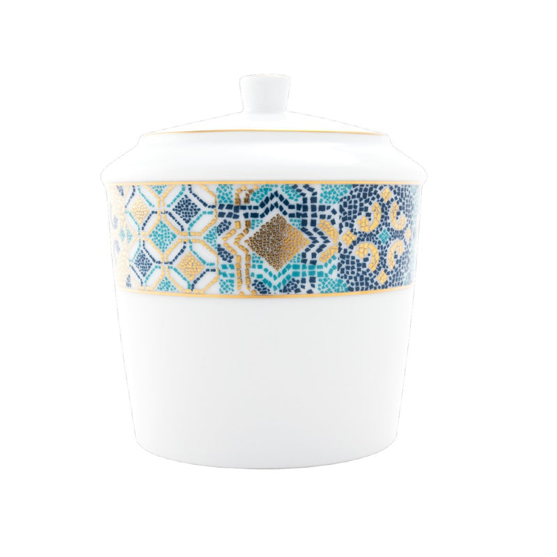 White sugar bowl with a decorative blue and gold band on a white background