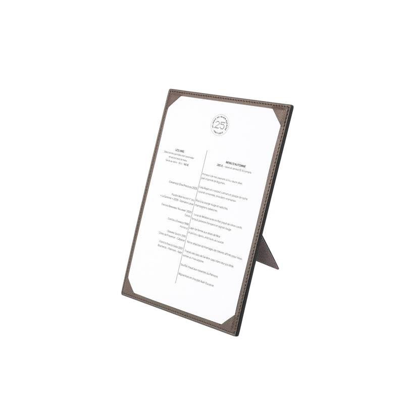 A brown calfskin leather menu holder with a A6 size label, designed for holding menus in a professional setting.