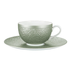Raynaud Minéral Irisé Céladon porcelain tea cup and saucer with iridescent celadon glaze and sculptural relief

