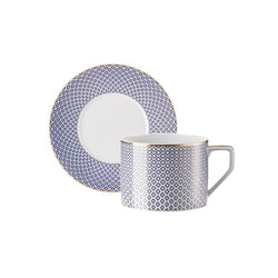Francis Carreau Blue porcelain tea cup extra with saucer featuring royal blue and gold check design by Rosenthal
