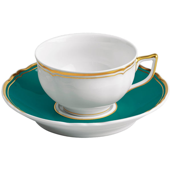 Mazurka Turquoise tea cup and saucer by Raynaud in Limoges porcelain with turquoise border and hand-painted gold rim, designed for elegant tea service.