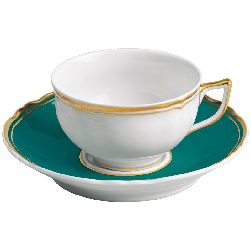 Mazurka Turquoise tea cup and saucer by Raynaud in Limoges porcelain with turquoise border and hand-painted gold rim, designed for elegant tea service.