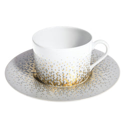 Souffle d’Or tea cup and saucer by Haviland—Limoges porcelain with celestial grey, silver, and matte gold design.