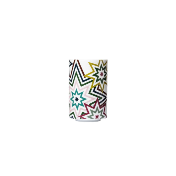 Paraiso small porcelain tea strainer beaker with colorful star motifs in green, yellow, pink, and teal by Sieger by Fürstenberg