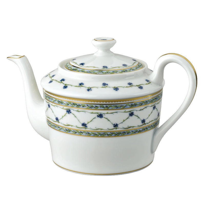 A white porcelain tea pot with blue and gold floral patterns, featuring a lid and a handle.