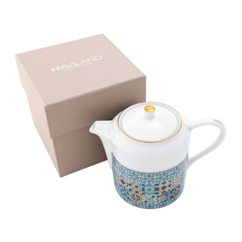 Haviland teapot with decorative pattern on a white background
