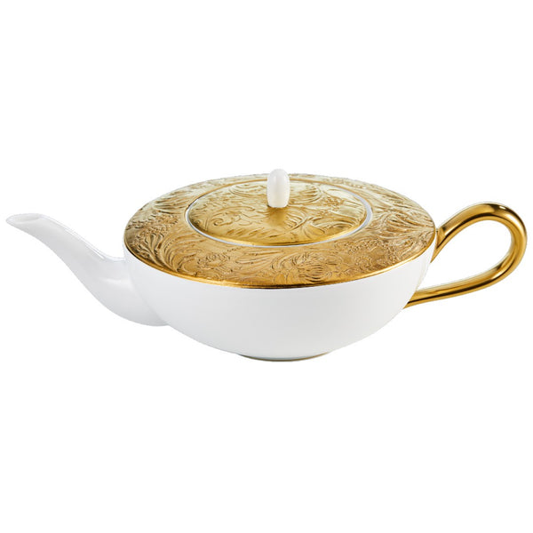 Porcelain teapot with gold handle, spout, and detailing from the Italian Renaissance Gold collection by Raynaud.