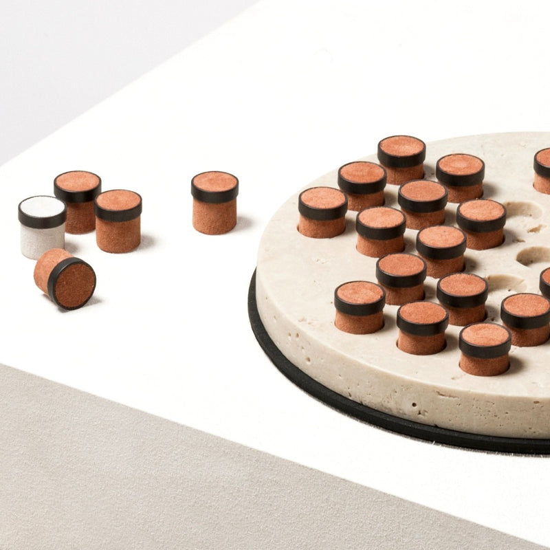 Styled Tivoli round marble solitaire game set with leather-inlaid metal pieces by Giobagnara
