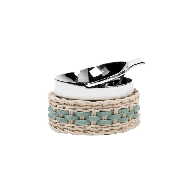 A 'Toledo' Leather & Rattan Ashtray with a chrome-plated brass base, partially woven mint-colored leather and rattan cover.