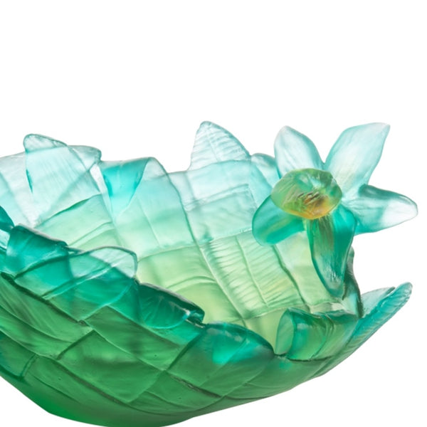 Green crystal flower bowl close-up on a white background