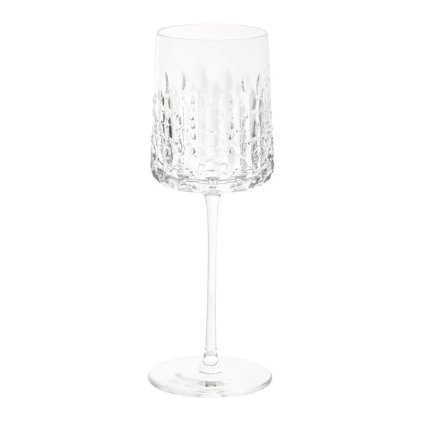 Ulysse water glass by Cristallerie de Montbronn, featuring siren-scale cuts inspired by Homer’s Odyssey.