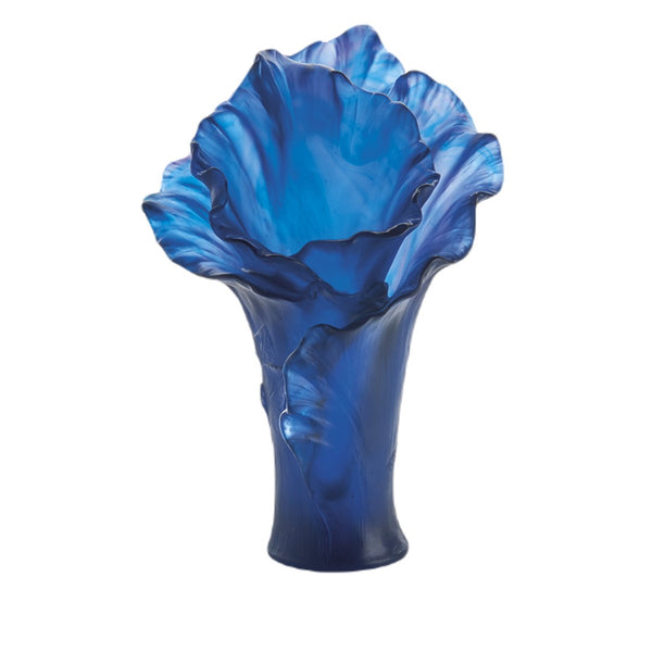 Blue glass vase Arum by Daum with a scalloped edge on a white background