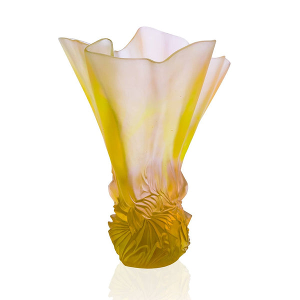 Decorative glass vase with a yellow and white gradient on a white background