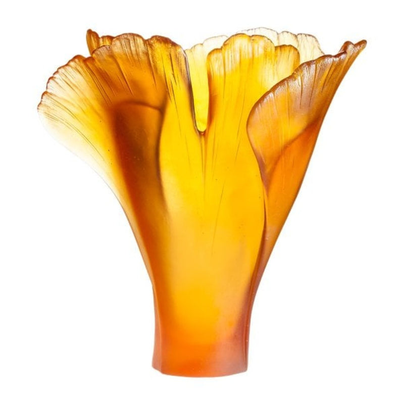 Orange glass vase with a unique shape on a white background