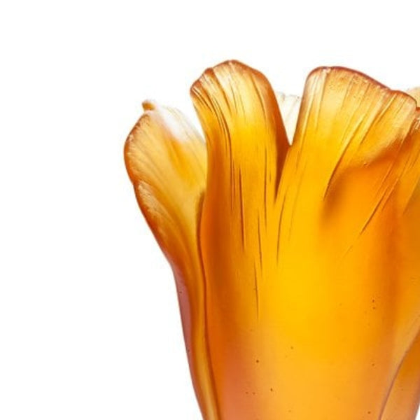 Close-up of a yellow glass vase on a white background