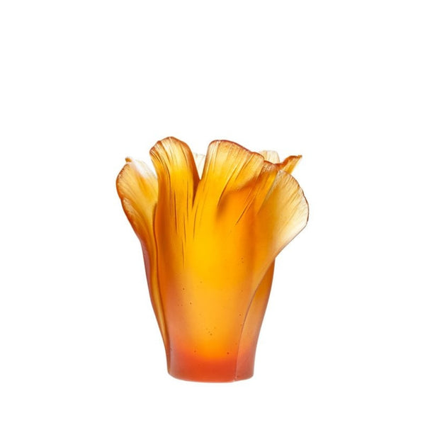 Orange glass vase with a wavy design on a white background