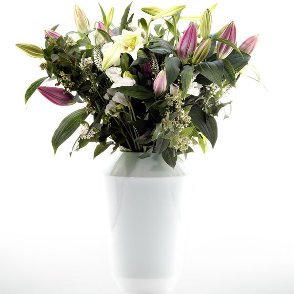 Styled Large Luna White porcelain vaseby Sieger by Fürstenberg with white and pink flowers