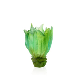 Green glass sculpture on a white background