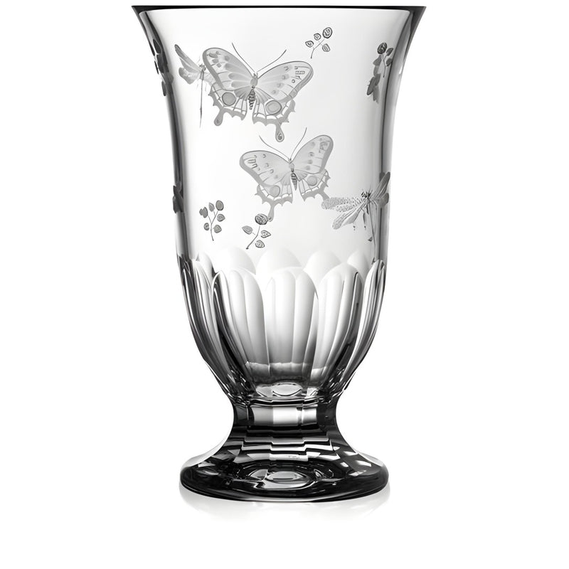 Clear glass vase with butterfly etchings on a white background
