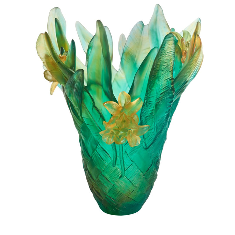 Decorative glass vase with green and yellow floral design on a white background