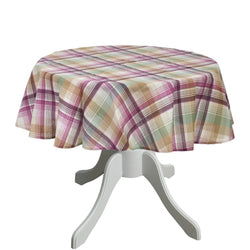 Round table with a plaid tablecloth on a white background