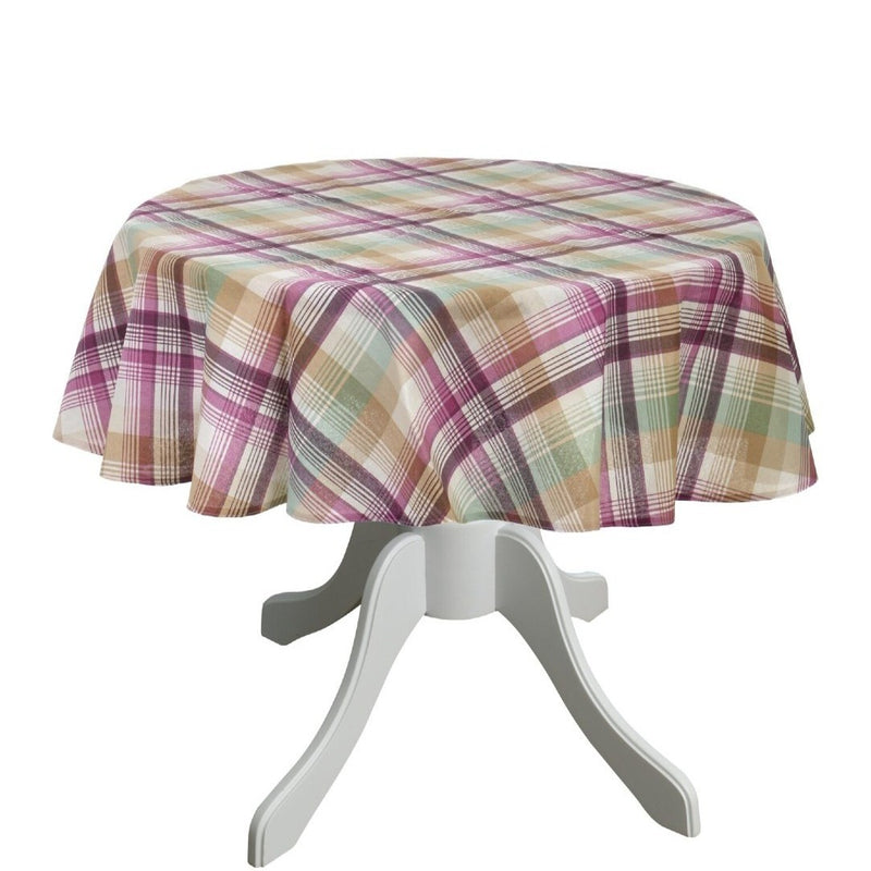 Round table with a plaid tablecloth on a white background
