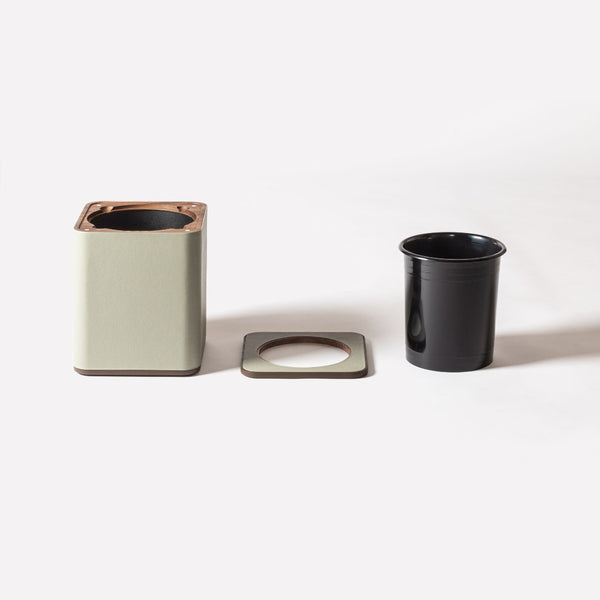 all the parts of the Luxury leather wastepaper bin by Giobagnara x Poltrona Frau with Pelle Frau leather, removable lid and inner container.