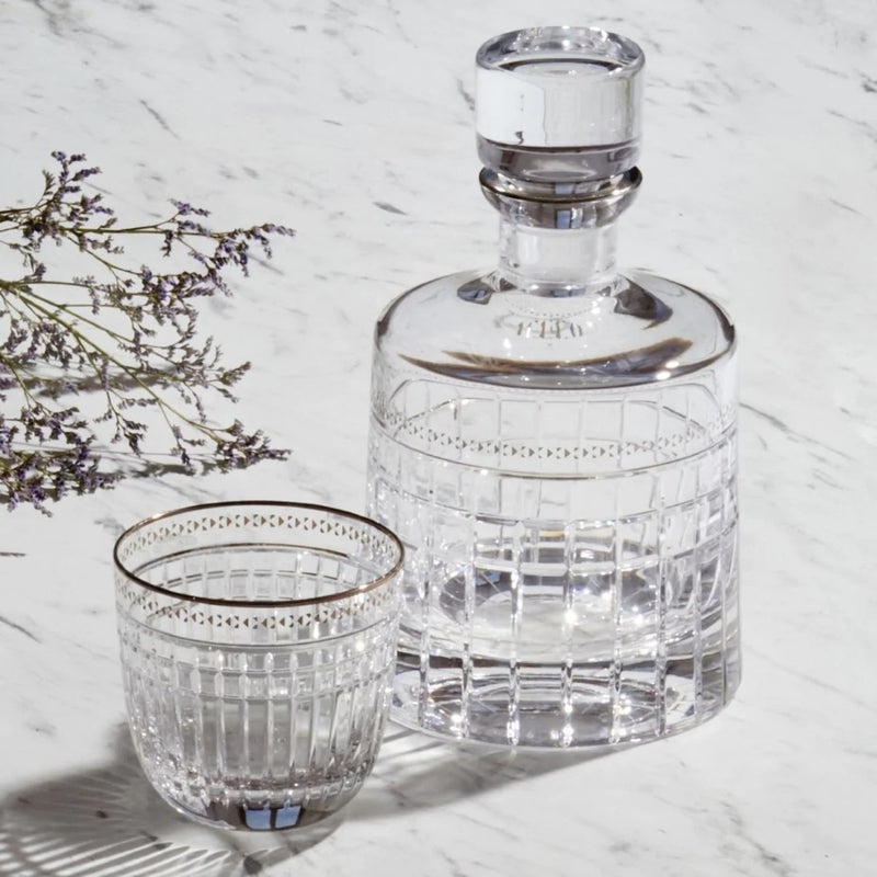 Styled Aghata crystal whiskey decanter with platinum rim and geometric cut design by Cristallerie de Montbronn