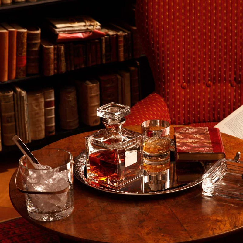 Decanter and Crystal Whisky Glass with Wide Silver Rim – Paris by Sonja Quandt on a tray with books in the background