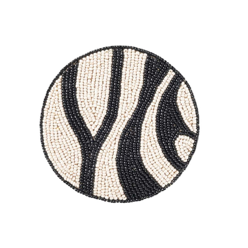 Zebra striped beaded drink coaster by Joanna Buchanan, bold black table decor


