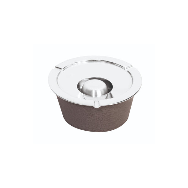 A round graphite-colored ashtray with a chrome-plated brass structure and a removable all-leather cover.
