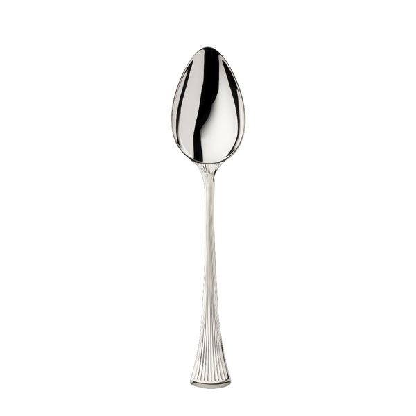 Silver-plated Avenue menu spoon with sculpted ridges reflecting light in a refined dining setting.