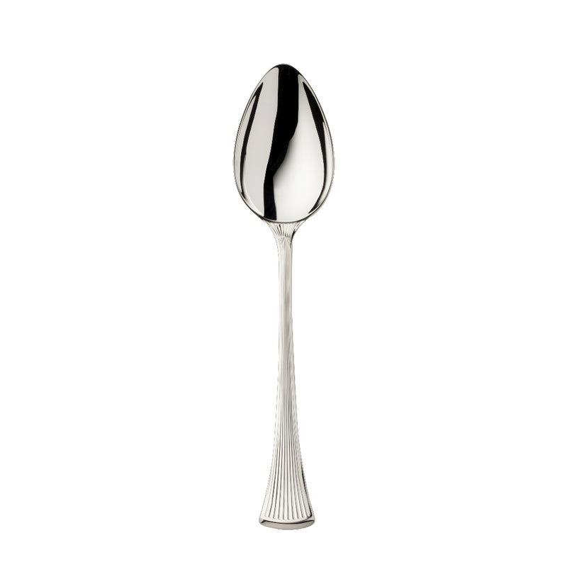 Silver-plated Avenue menu spoon with sculpted ridges reflecting light in a refined dining setting.